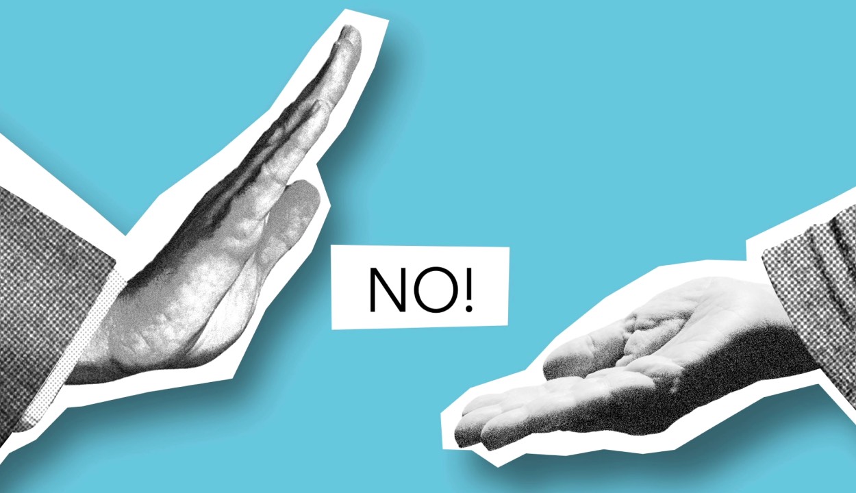 Two hands with a NO sign in between