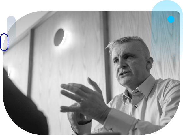 Matthew Needham speaking and gesturing while running a workshop